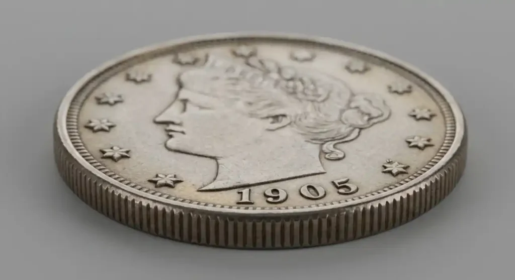 A single 1905 nickel angled to show edge and face